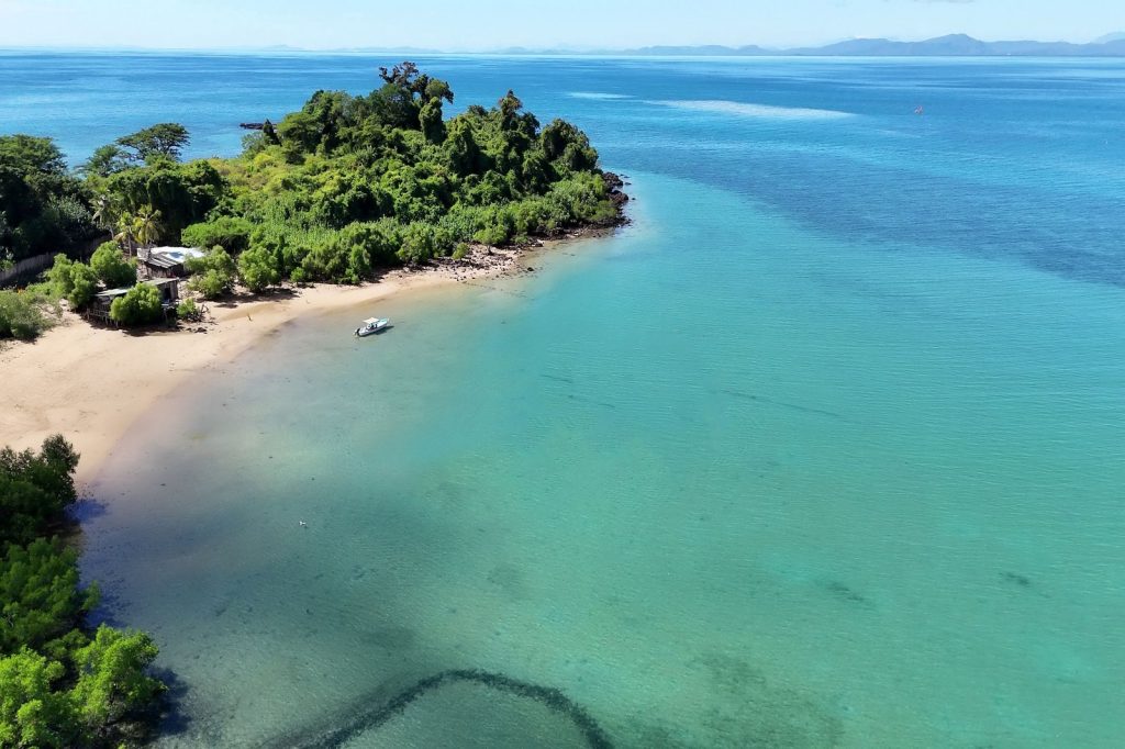 large image of nosy faly property with boat docked in bay