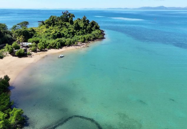 large image of nosy faly property with boat docked in bay