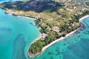 large scale image of the entire nosy faly property with both beaches, bay and houses