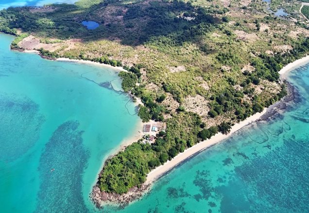 large scale image of the entire nosy faly property with both beaches, bay and houses