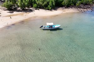 image of nosy faly property with boat docked in bay